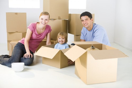 Removal team preparing items with safety equipment and protective planning
