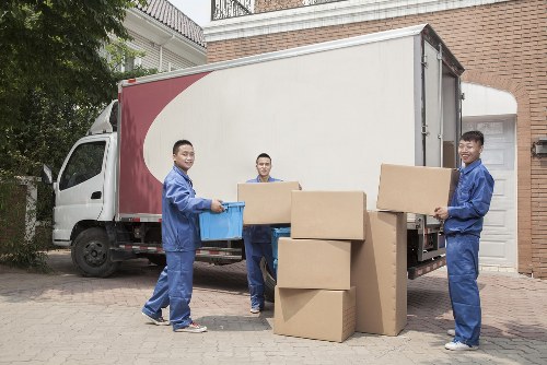 Removal van and moving boxes representing a booked UK removal service