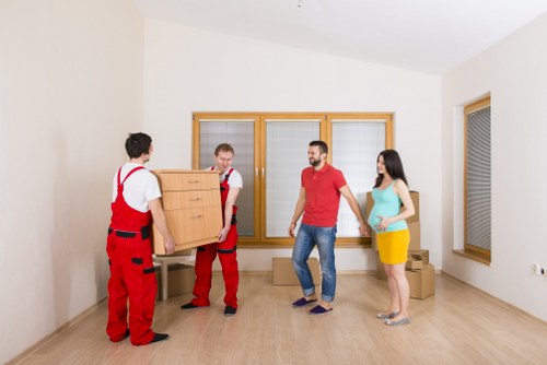 Man and van in Teddington loading household furniture for a local move