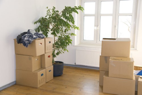 Office furniture being loaded into a removal van