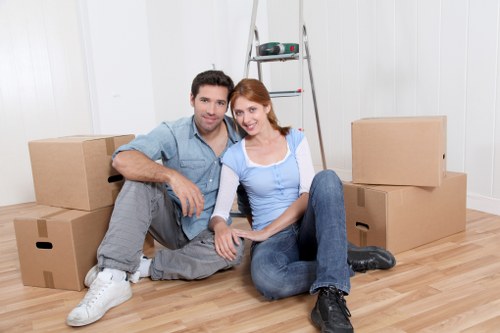 Furniture and boxes loaded into a van for transport in Teddington