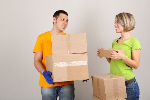 Professional movers handling furniture during a Teddington relocation