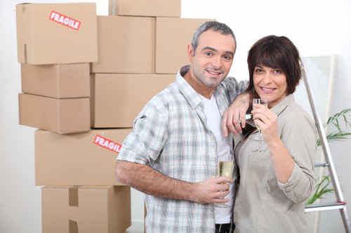 A coordinated office move in Teddington with labelled boxes and furniture transport